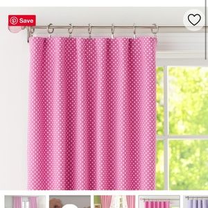 Bright pink with white polka curtains